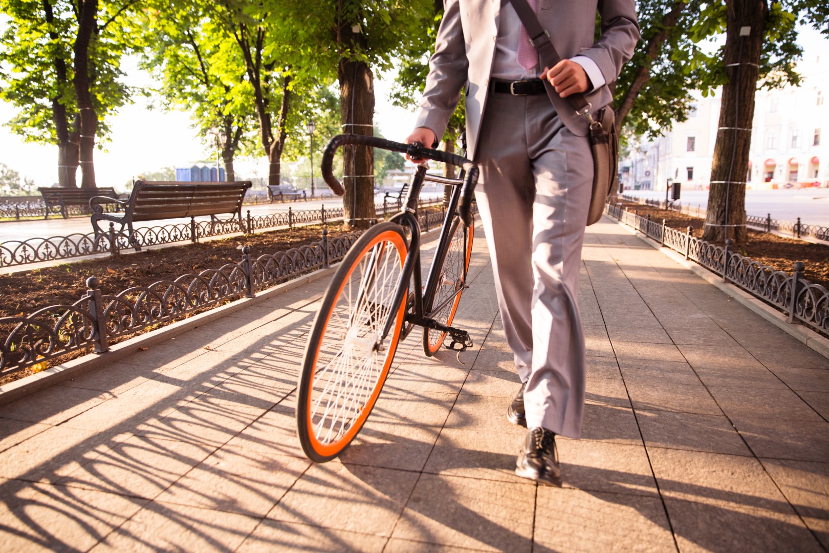Cyclist planning a route on a map